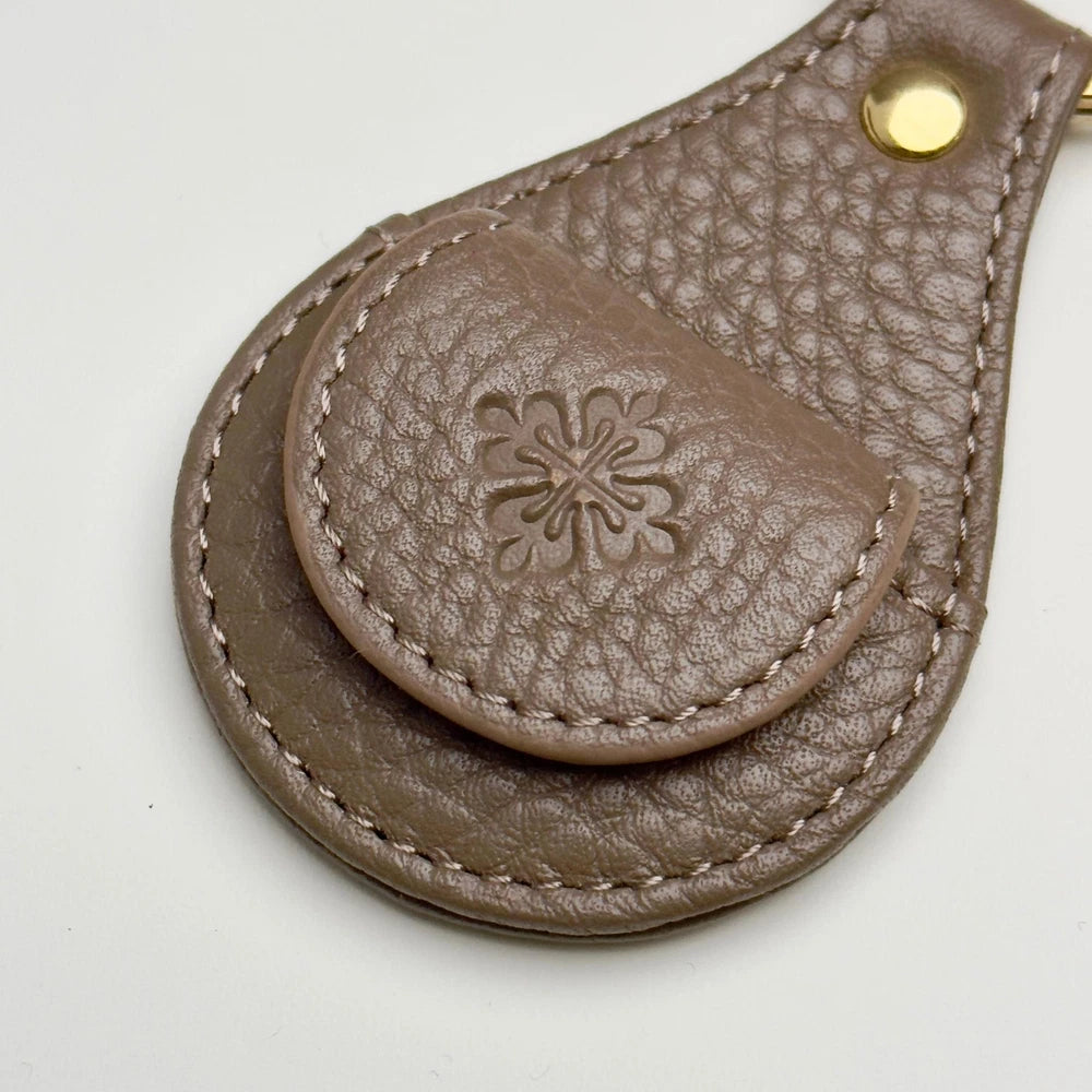 PATEK PHILIPPE TAUPE LEATHER KEYCHAIN - CALATRAVA EMBLEM