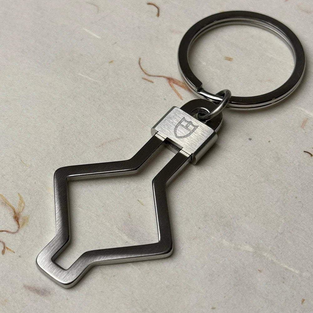 TUDOR ACCESSORIES SNOWFLAKE KEYCHAIN #001 IN STAINLESS STEEL