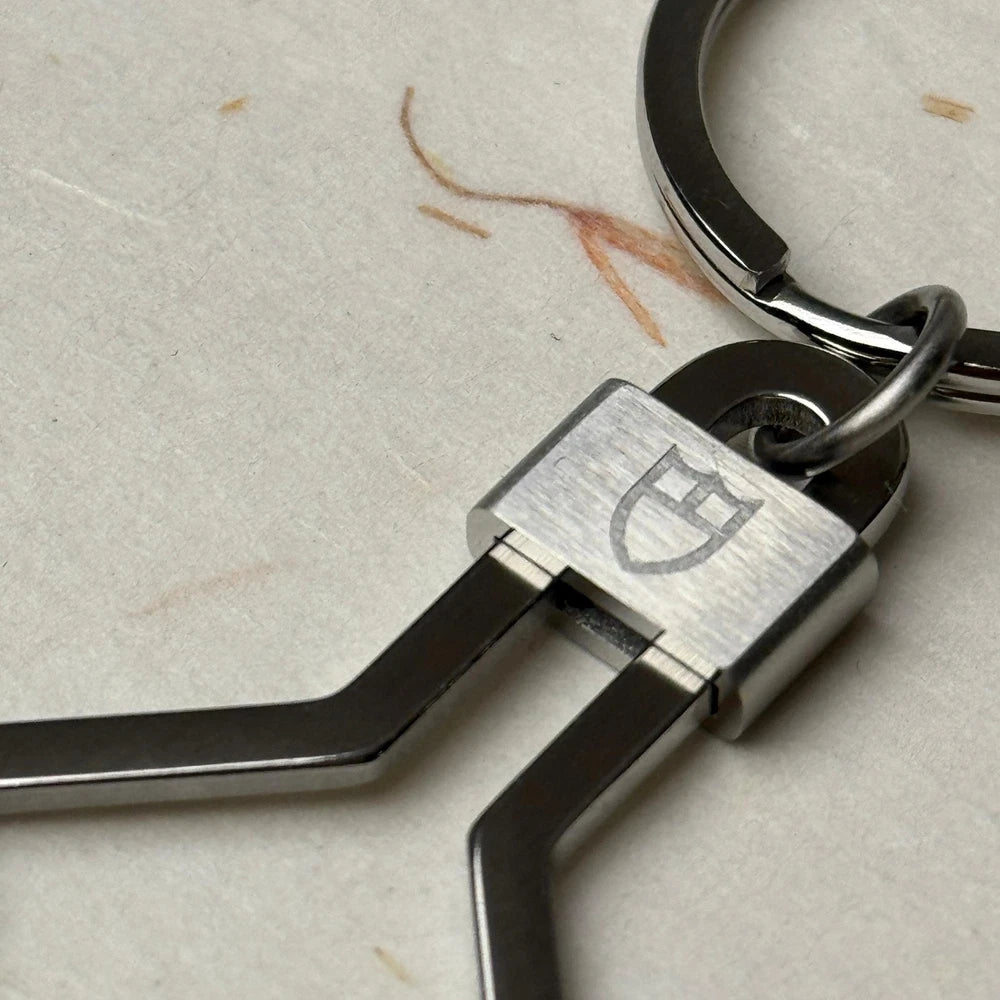 TUDOR ACCESSORIES SNOWFLAKE KEYCHAIN #001 IN STAINLESS STEEL