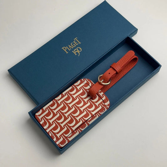 PIAGET 150TH ANNIVERSARY RED LEATHER LUGGAGE TAG