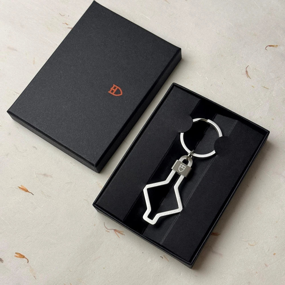 TUDOR ACCESSORIES SNOWFLAKE KEYCHAIN #001 IN STAINLESS STEEL