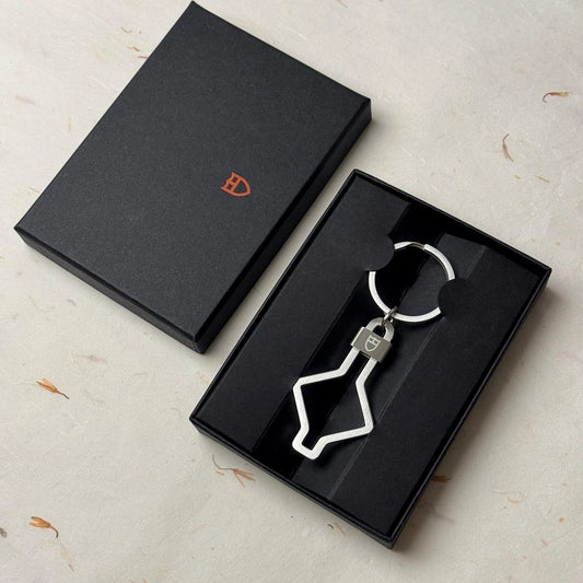 TUDOR ACCESSORIES SNOWFLAKE KEYCHAIN #001 IN STAINLESS STEEL