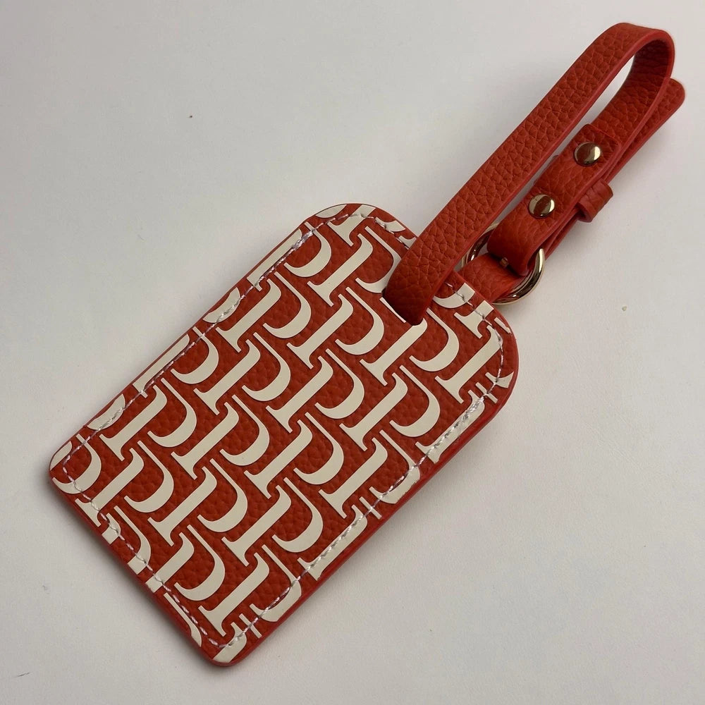 PIAGET 150TH ANNIVERSARY RED LEATHER LUGGAGE TAG