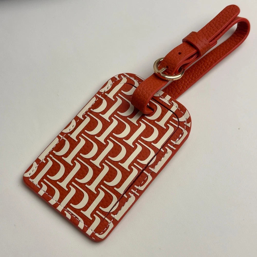 PIAGET 150TH ANNIVERSARY RED LEATHER LUGGAGE TAG