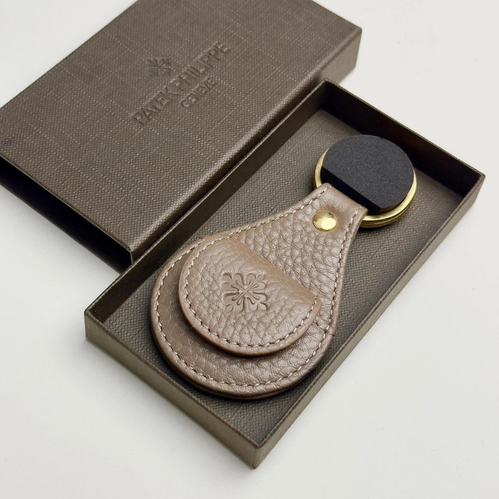 PATEK PHILIPPE TAUPE LEATHER KEYCHAIN - CALATRAVA EMBLEM