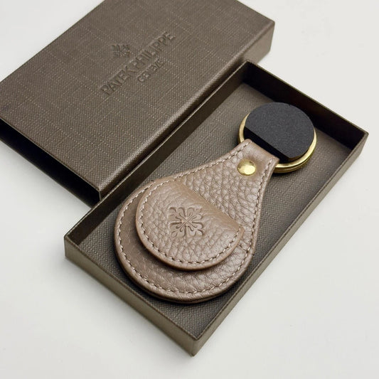 PATEK PHILIPPE TAUPE LEATHER KEYCHAIN - CALATRAVA EMBLEM