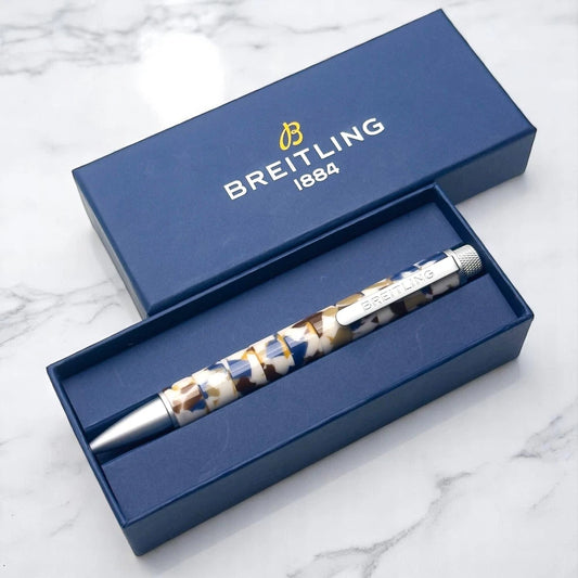 BREITLING MOSAIC SWIRLED BALLPOINT PEN – BLUE, WHITE, AND GOLD MARBLED DESIGN