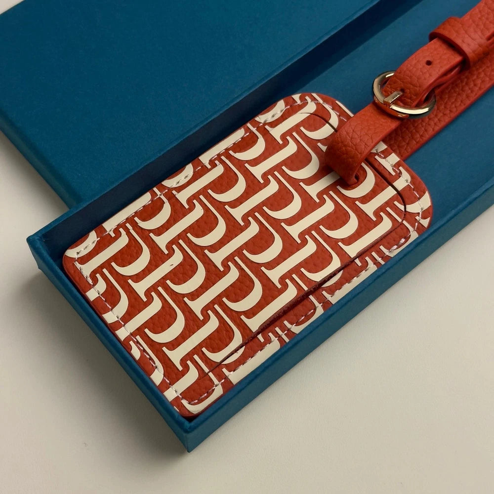 PIAGET 150TH ANNIVERSARY RED LEATHER LUGGAGE TAG
