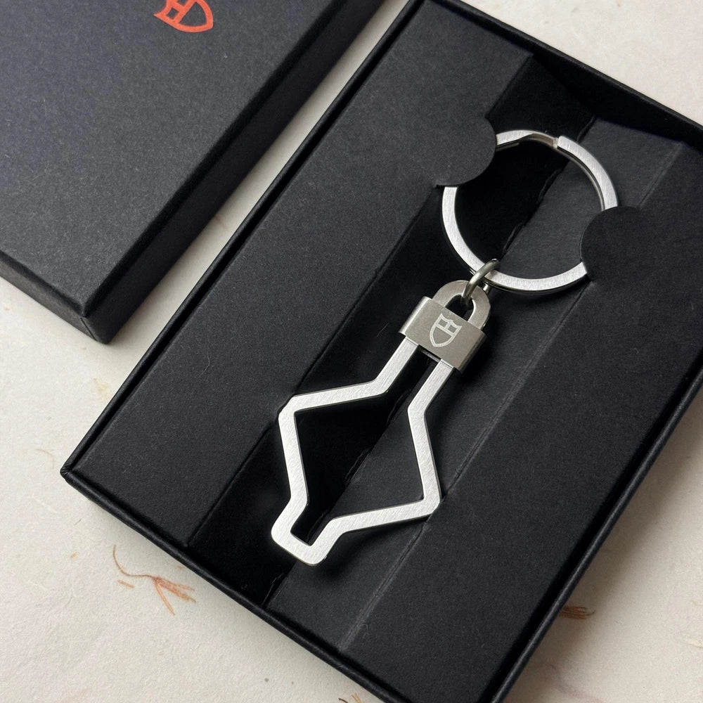 TUDOR ACCESSORIES SNOWFLAKE KEYCHAIN #001 IN STAINLESS STEEL