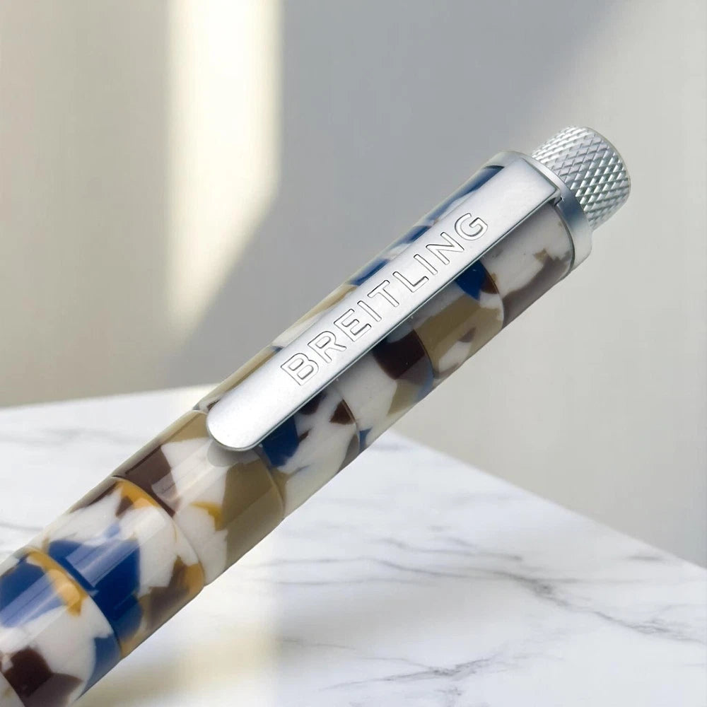 BREITLING MOSAIC SWIRLED BALLPOINT PEN – BLUE, WHITE, AND GOLD MARBLED DESIGN